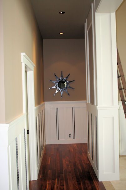 Hallway with matching wainscoting and rope inlay trim