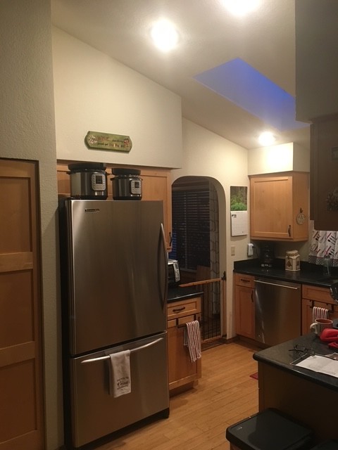 Original kitchen refrigerator wall before remodel