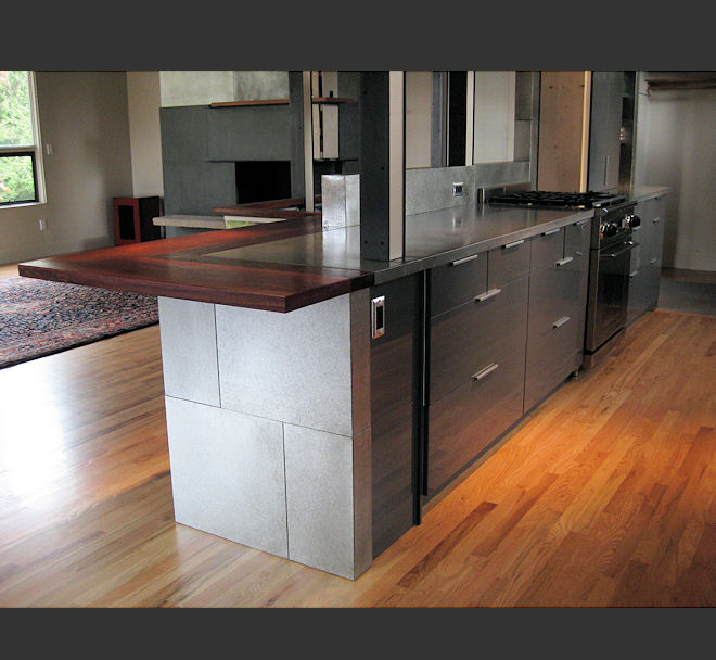 Remodeled kitchen with new island and cabinetry after renovation